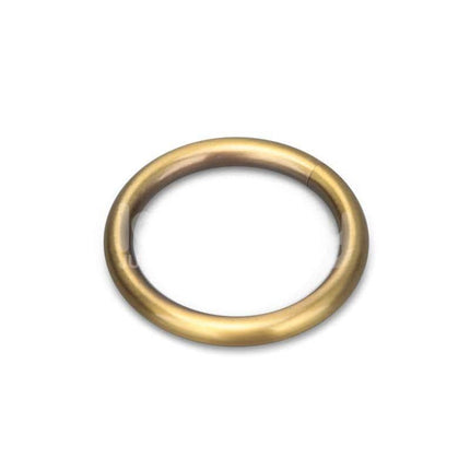Golden circular ring accessory for Rebellion Reign Tie Collar