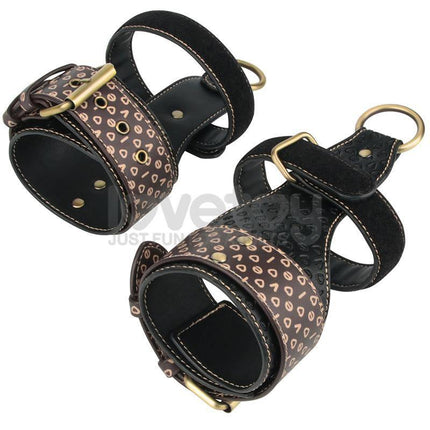 Rebellion Reign Under Mattress Restraint - PU cuffs with heart pattern for secure and discreet adult play