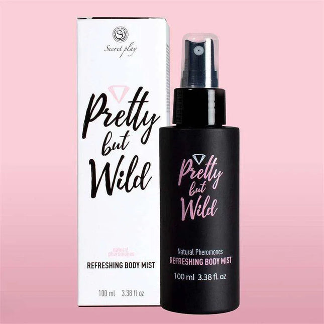 Pretty But Wild Refreshing Body Mist 100ml spray bottle on a pink background