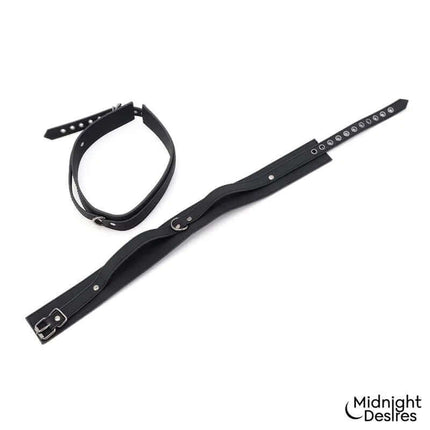 Restrain Set with Hand and Thigh Cuffs by Midnight Desires showing black leather adjustable cuffs and restraints.