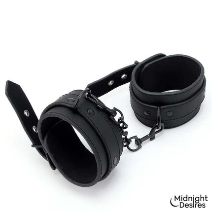 Restraint Set with Collar with Leash and Cuffs in vegan leather, featuring adjustable wrist cuffs for dynamic play.