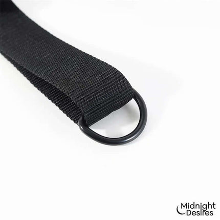 Detail of vegan leather strap from Restraint Set with Neck Suport, featuring adjustable buckle and metal ring.