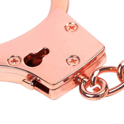 Rose Gold Color Cuffs Skull Keys with durable zinc alloy body and chic finish, ideal for intimate moments in mature couples.