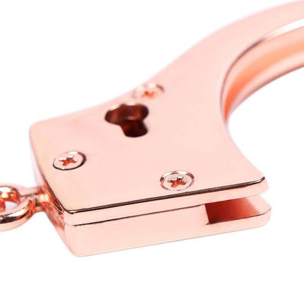 Close-up of Rose Gold Color Cuffs Skull Keys showing elegant rose-gold finish and distinctive skull-shaped keyhole, perfect for mature couples.