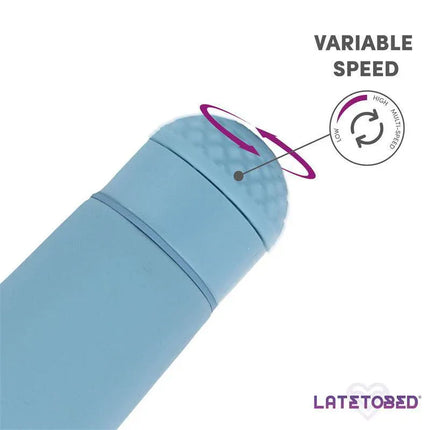 Close-up of Sander Mini Wand Massage showing variable speed control knob on a premium silicone body.