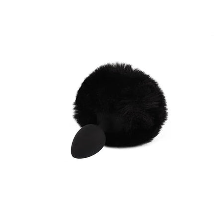 Señuelo Small Bunny Tail Butt Plug with fluffy black pompom tail on white background.