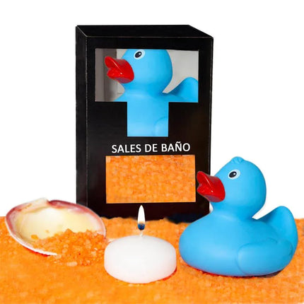 Set Bath Salts Aroma Mango, Duck, Candle and Shell 150 gr displayed with a blue duck, candle, and shell for a tropical bath experience.