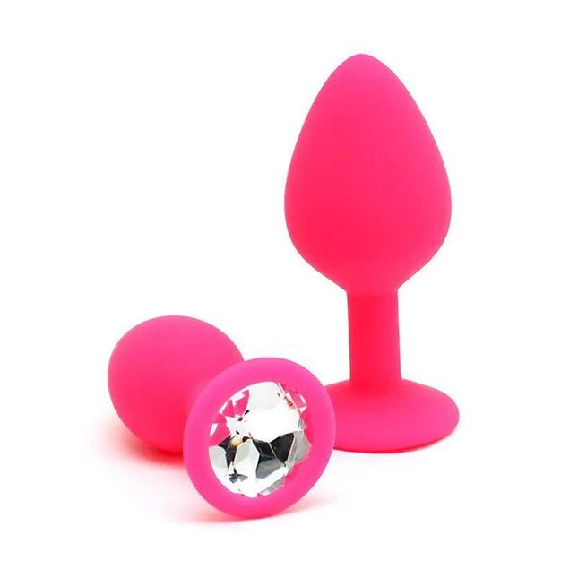Set de Plugs Anales Berlin Rosa, featuring two pink silicone anal plugs with a jeweled base for beginners and couples.