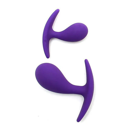 Set of 2 Anatomic Butt Plugs Copenhagen Purple in silicone, showing dual-size and comfortable design for versatile use.