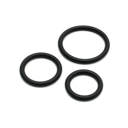 Set of 3 silicone penis rings in varying sizes displayed on white background
