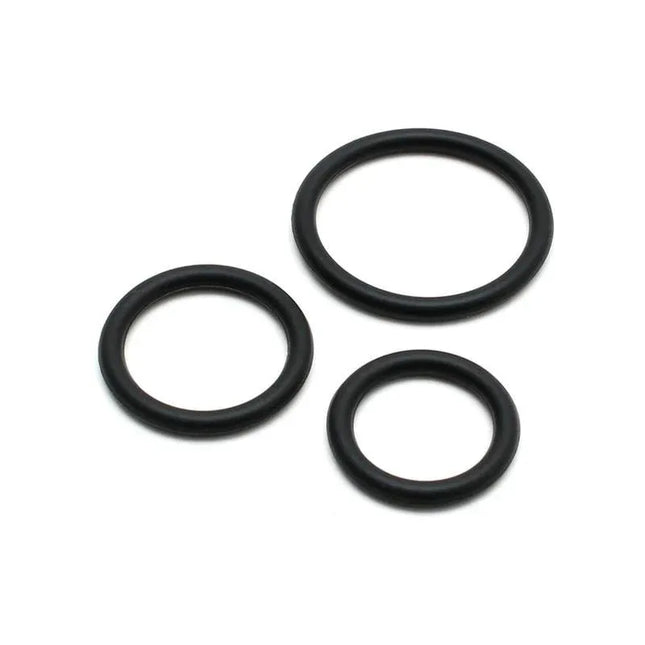 Set of 3 silicone penis rings in varying sizes displayed on white background