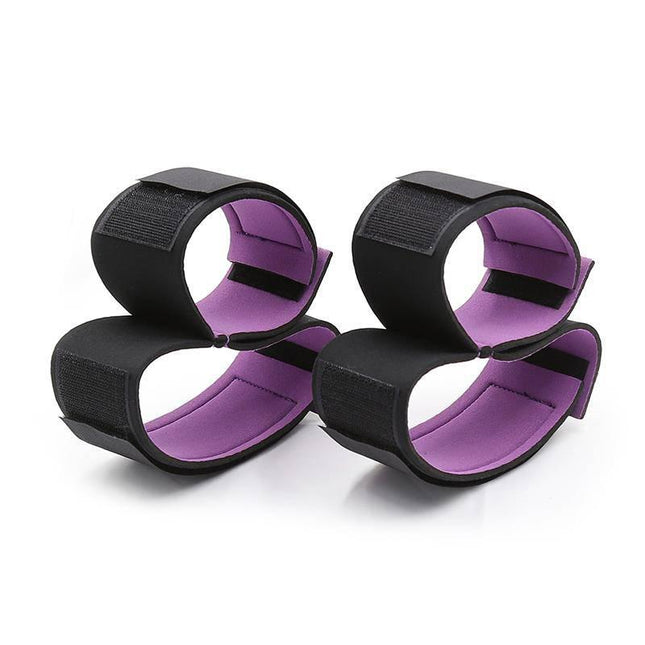 Set of restraints with handcuffs and Anklecuffs Adjustable in black and purple for safe BDSM play.