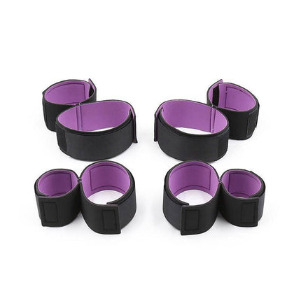 Set of restraints with handcuffs and Anklecuffs Adjustable in purple and black, designed for comfort and secure BDSM play.