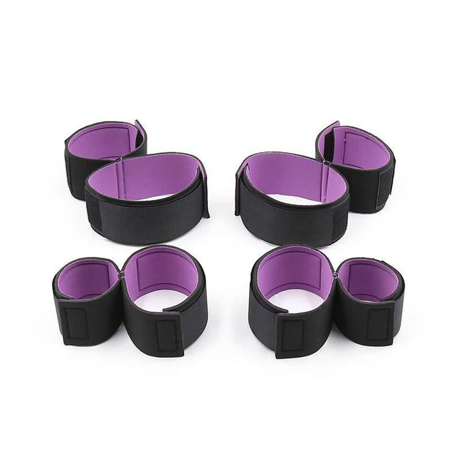 Set of restraints with handcuffs and Anklecuffs Adjustable in purple and black, designed for comfort and secure BDSM play.