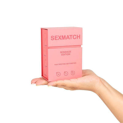 Hand holding Sexmatch Game Bondage Edition box, provocative two-player card game for intimate fun.