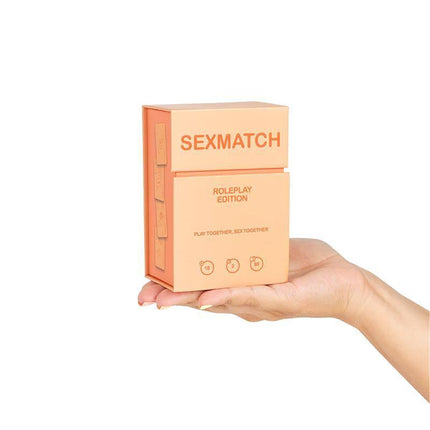 Hand holding Sexmatch Game Roleplay Edition box, showcasing the card game for couples with 89 cards.