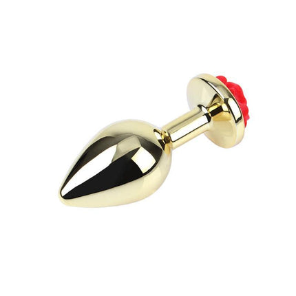 Showy Rose Anal Plug with Rose Jewel Size L, gold-plated metal plug with red rose ornament and heart-shaped base.