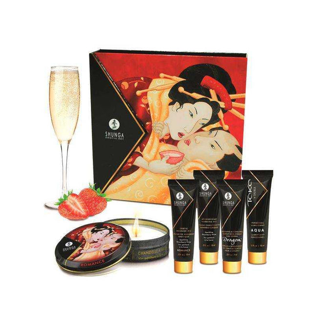 Shunga Geisha Secrets Kit Sparkling Wine travel set with erotic art packaging, strawberry, and candle for a sensual experience.