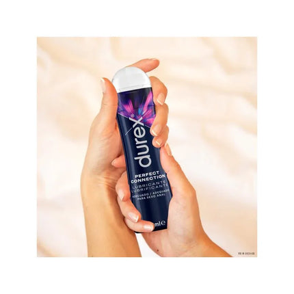 Person holding Silicone Base Lubricant Perfect Connect 50ml, providing smoother, longer-lasting glide for various types of intimacy.