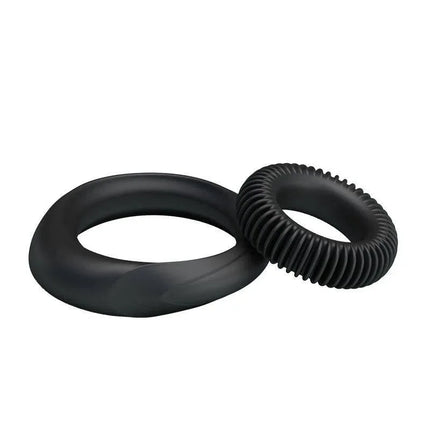 Silicone Cock Ring Set - Manhood Set of 2 with two elastic black rings for performance and comfort.