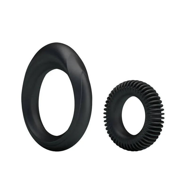 Silicone Cock Ring Set - Manhood Set of 2 featuring two black textured rings for enhanced performance and comfort.