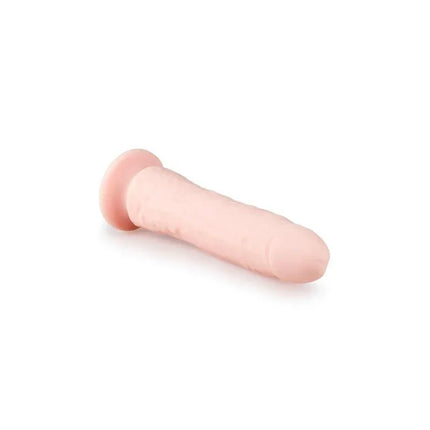 Silicone Dildo Flesh - 21 cm with realistic texture and soft silicone material for enhanced stimulation.