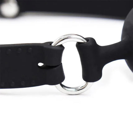 Close-up of the adjustable strap on Silicone Dildo Gag Ball Adjustable 36-52 cm with metal ring clasp.