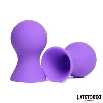 Silicone Nipple Suckers Purple, body-safe suction devices for intimate moments, shown in elegant purple design.