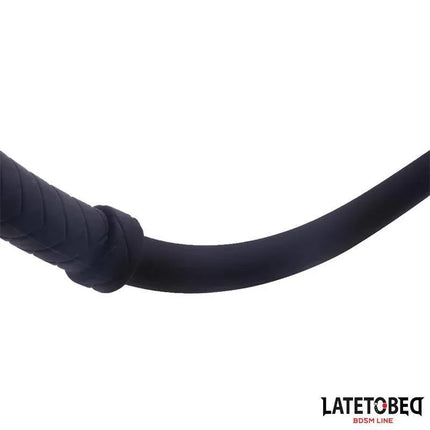 Close-up of the Silicone Whip 61 cm from Latetobed BDSM Line, showing the smooth grip and flexible design made from premium silicone.