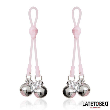 Skull Nipple Clamps with Ring Bells in pink, featuring playful skull motif and chime bells for intimate moments.