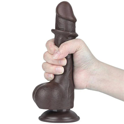 Hand holding Sliding Skin Dual Layer Dildo 7.5 showcasing realistic texture and design.