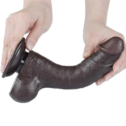 Hands holding the Sliding Skin Dual Layer Dildo 8 showcasing its realistic design and flexible dual-layer construction.
