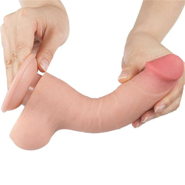 Hands holding Sliding Skin Dual Layer Dildo 8 showcasing realistic dual-density TPE construction and lifelike texture.