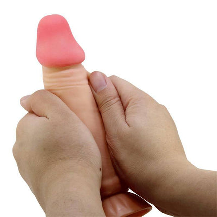 Sliding Skin Realistic Dildo 19.4 cm held in hands, showcasing lifelike texture and design.