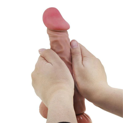 Hands holding Sliding Skin Realistic Dildo 24 cm, showcasing lifelike details and texture.