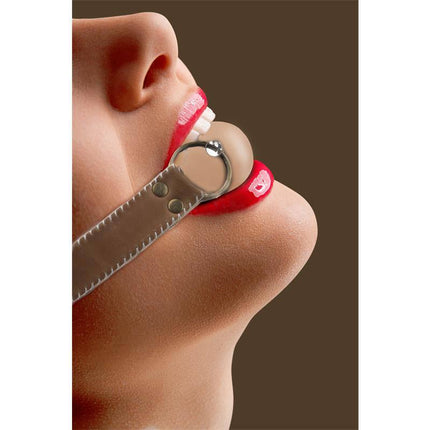 Solid Ball Gag with brown leather straps and adjustable buckle on model's face, showcasing elegant stitching and secure fit.