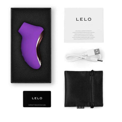 Sona 2 Travel Clitoris Sucker Purple with accessories including charger and pouch in packaging from LELO.