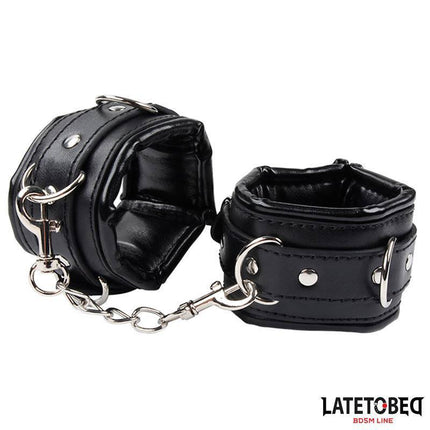 Black Sponge Ankle Cuff with chain from Latetobed BDSM line, made of PU and metal for comfort and restraint.