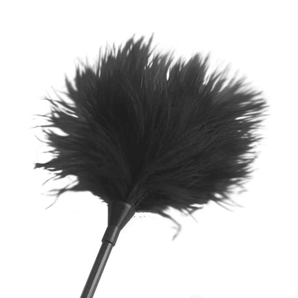 Black feather tickler from Starters Bondage Set 4 Pieces Black for playful and sensual experiences.