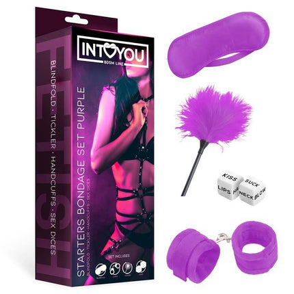 Starters Bondage Set 4 Pieces Purple package with blindfold, feather tickler, dice, and cuffs for playful exploration.