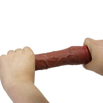 Stevenson Extended Penis Sleeve being held, showcasing lifelike TPR texture for added length and fullness.