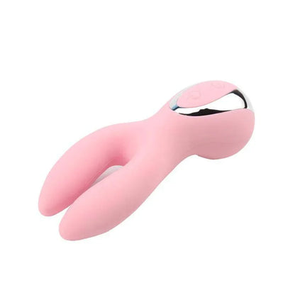 Stimulator Dreamlike Rabbit compact vibrator with ergonomic handle and rabbit ears in pink.
