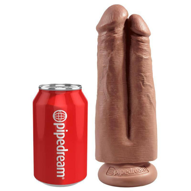 Double dildo next to soda can for size comparison