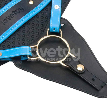 Close-up of a black and blue strap for a Strap On with Vibrating Dildo 8.5, featuring a secure harness design.
