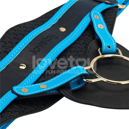 Close-up of Strap On with Vibrating Dildo 9.5 harness in blue and black, featuring a secure fit design for powerful pleasure.