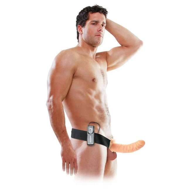 Person wearing Strap-On with Vibrating Hollow Dildo Flesh harness and dildo