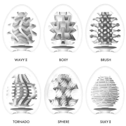 Pack of 6 Tenga Eggs Standard Package featuring diverse textures including Wavy, Boxy, Brush, Tornado, Sphere, and Silky designs.