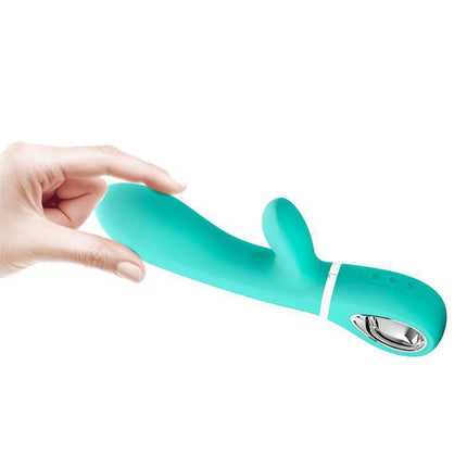 Thomas Vibrator G-Spot Aqua in hand, showcasing dual stimulation design and premium silicone material.