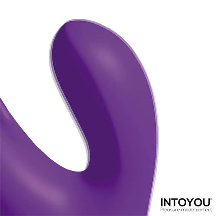 Close-up of Intoyou Triya Vibe with Flipping Tongue and Anal Beads in purple, highlighting the three-motor design for customized pleasure.