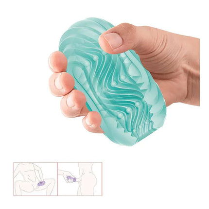 Hand holding Twist Angel Cupid X Masturbator Egg with gentle twist texture for stimulating solo or couples play.